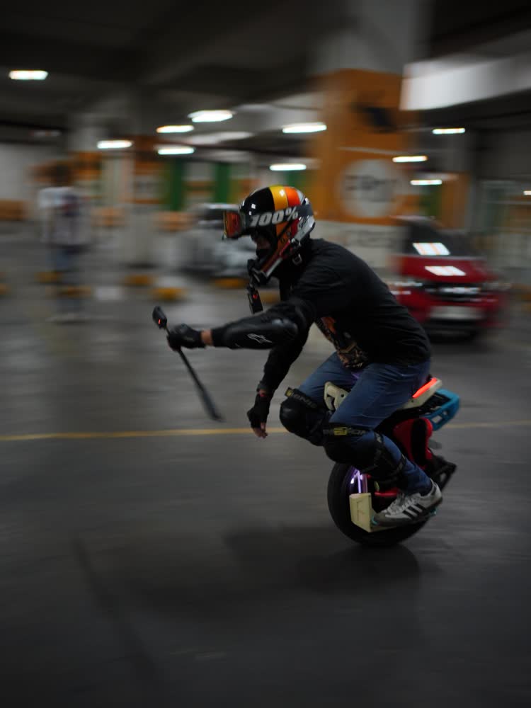Rider crouched low while carving a turn